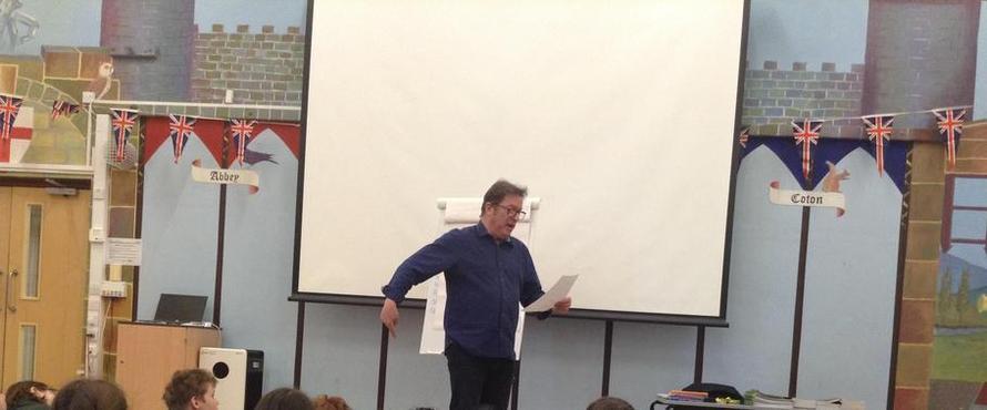 Paul reading one of his books - look at how happy the kids are.