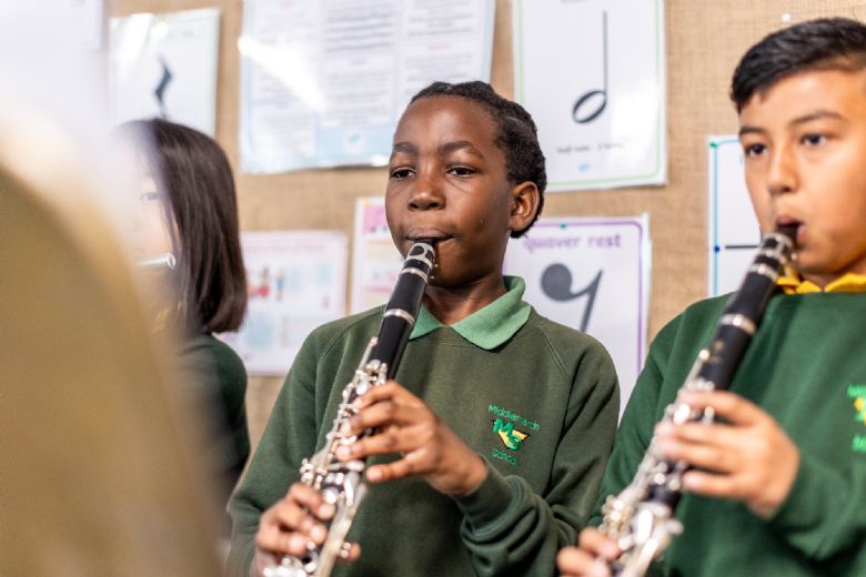 Two boys play clarinet